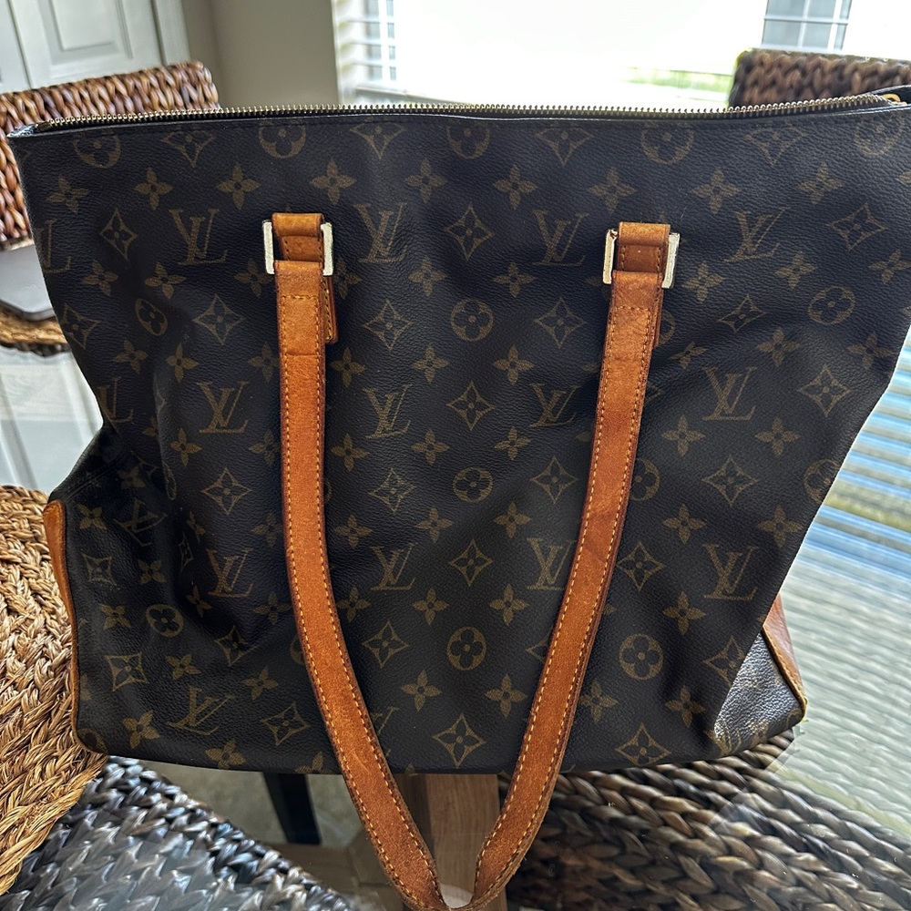 Authentic Large vintage Louis Vuitton. Fair condition.